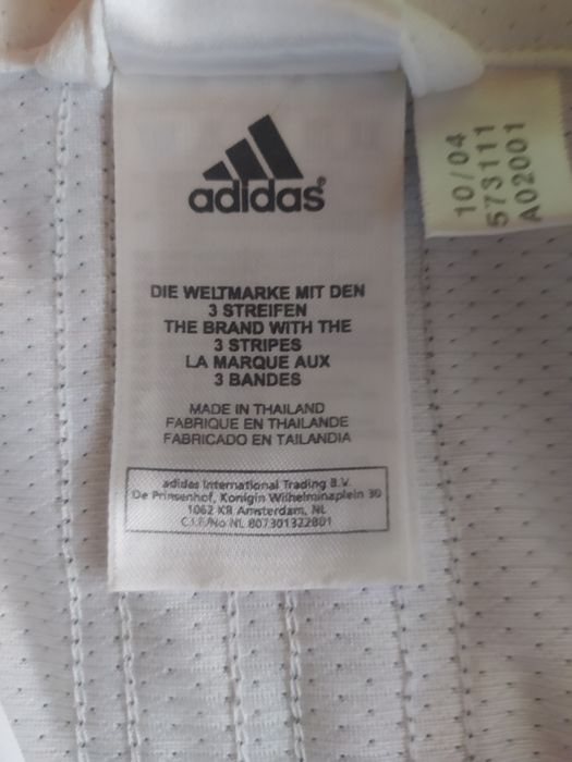 Biała kurtka w czarne paski Adidas