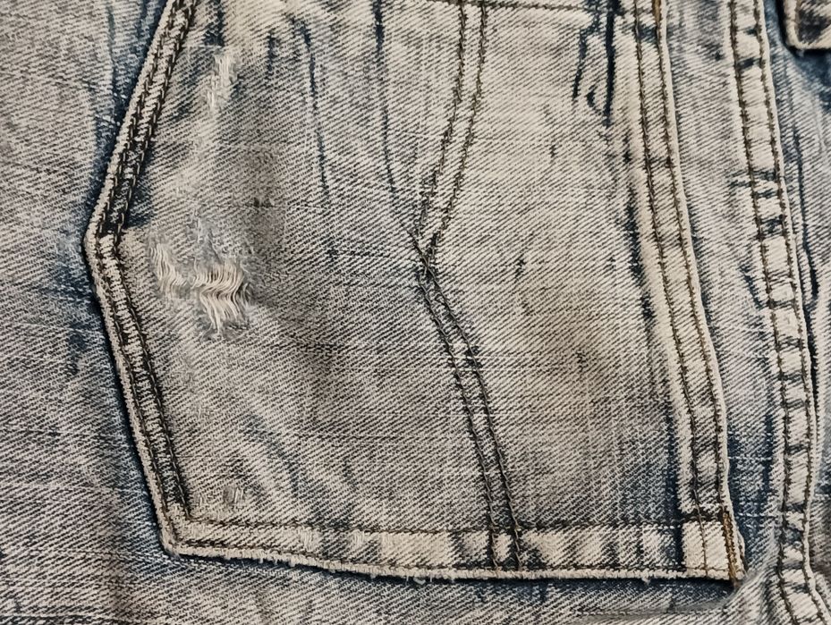 39* Spodnie męskie rozmiar 32 firmy Trang