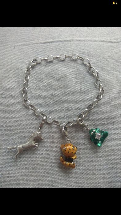 Srebrna bransoletka yes z charmsami