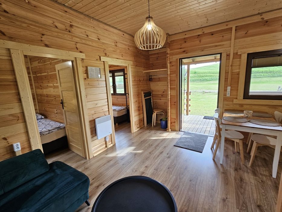 Domki letniskowe Przy Leśniczówce - Sauna - Jacuzzi - Domki nad jeziorem- Bory Tucholskie- Kaszuby, rodzinny wypoczynek, plac zabaw, stawy