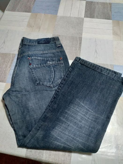 Leva 6 e paga cinco pares calças ganga mulher