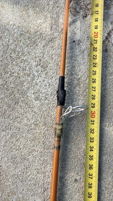 Cana de pesca antiga em fibra