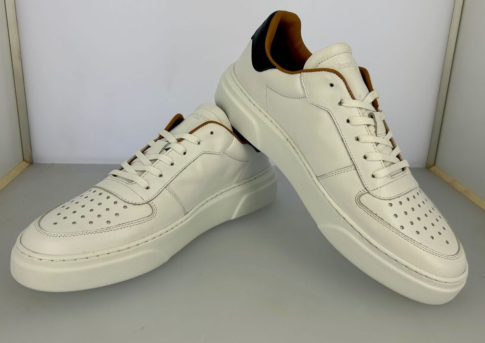 Ténis de homem em pele  de alta qualidade muito confortáveis!!