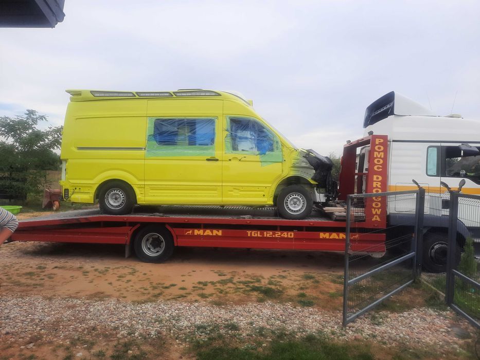 Przewóz laweta pomoc drogowa domek przyczepa koparka bus widlak maszyna ładowarka