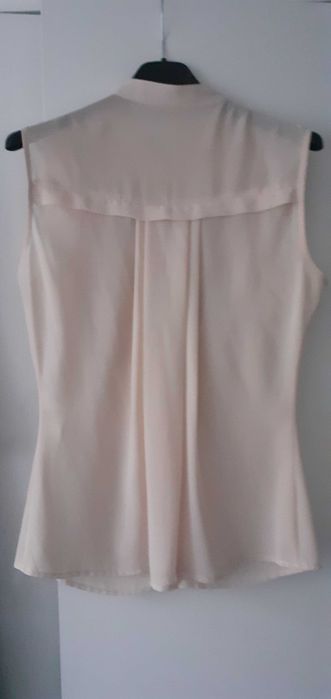 Kremowa bluzka damska z żabotem roz 36 firmy Reserved