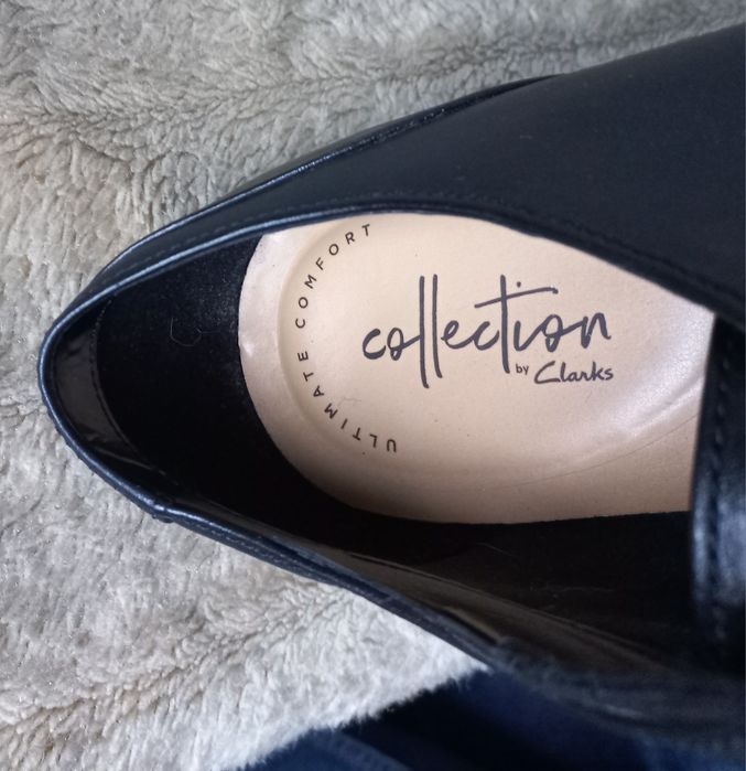 Męskie skórzane pantofle Clarks garniturowe 41,5