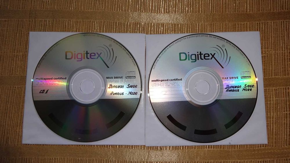 Игра Dungeon Siege для компьютера на  двух CD-дисках