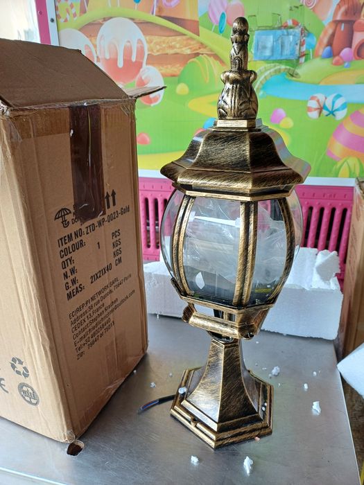 Candeeiros em metal e vidro