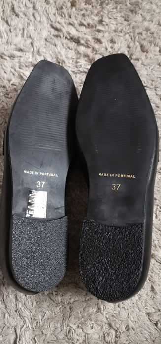 Sapatos de pele verdadeira