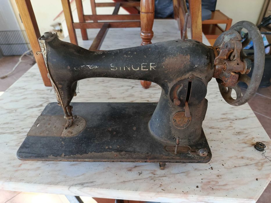 Máquina costura singer