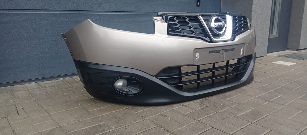 Zderzak przód przedni Nissan Qashqai J10 Lift zderzak grill  halogen