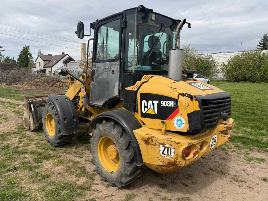 Caterpillar CAT 908H2, 2011 ROK ŁYŻKA OTWIERANA