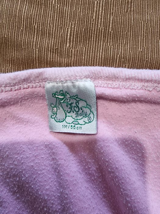 Manta e babete para bebé