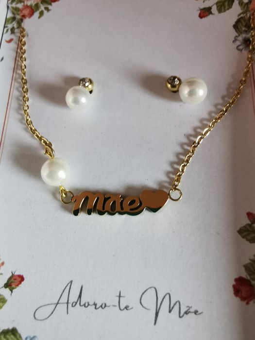 Conjunto brincos e colocar em aço dourado