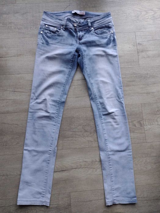 Spodnie jeans jasne damskie S