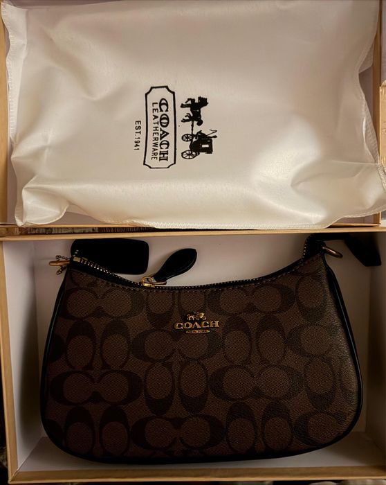 Mala Coach com caixa original