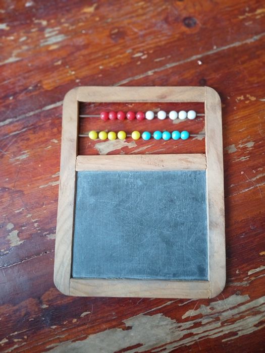 Vintage slate abacus for performing calculations