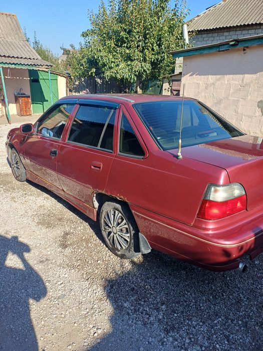 Деу Нексия н100.