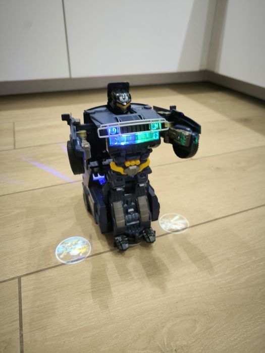 Prezent święta NOWY. Mikołaj Interaktywny pojazd policyjny policja dla dzieci Transformers świeci