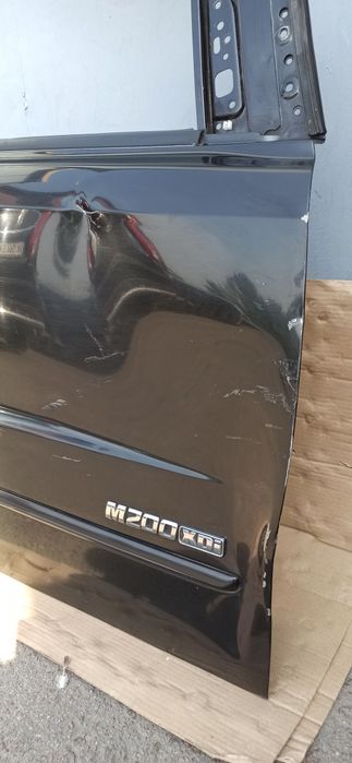 Двері праві передні ssangyong