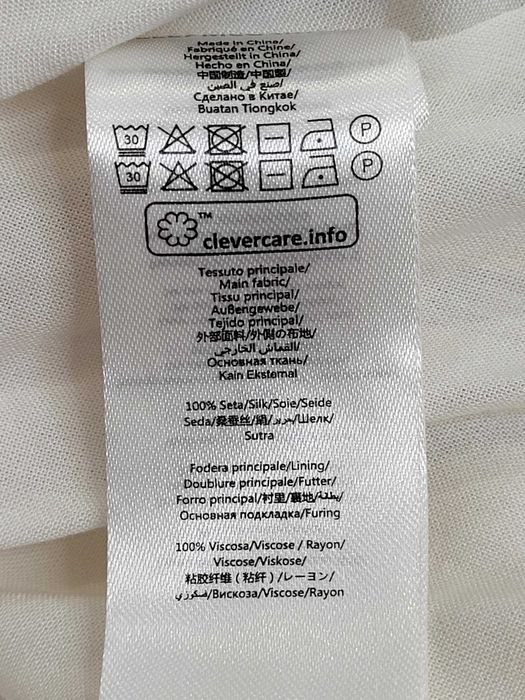Ніжне шовкове платтячко від  STELLA McCARTNEY для дівчинки 5-6 років.