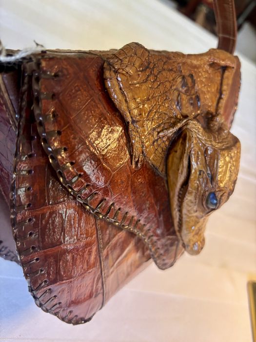Mala em pele de crocodilo verdadeira