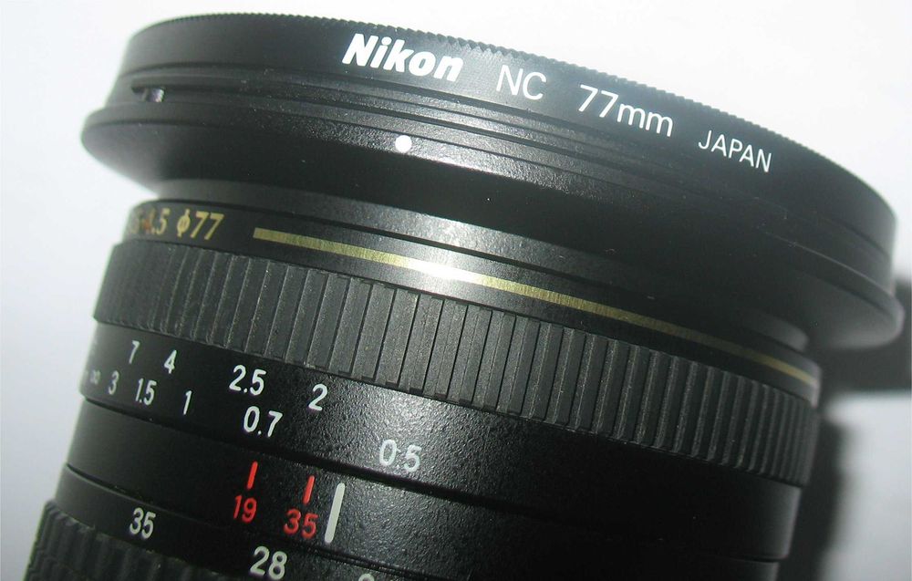 Nikon F55, Lente Tamron AF 19-35mm, Filtro Nikon NC 77mm,Bolsa Soligor