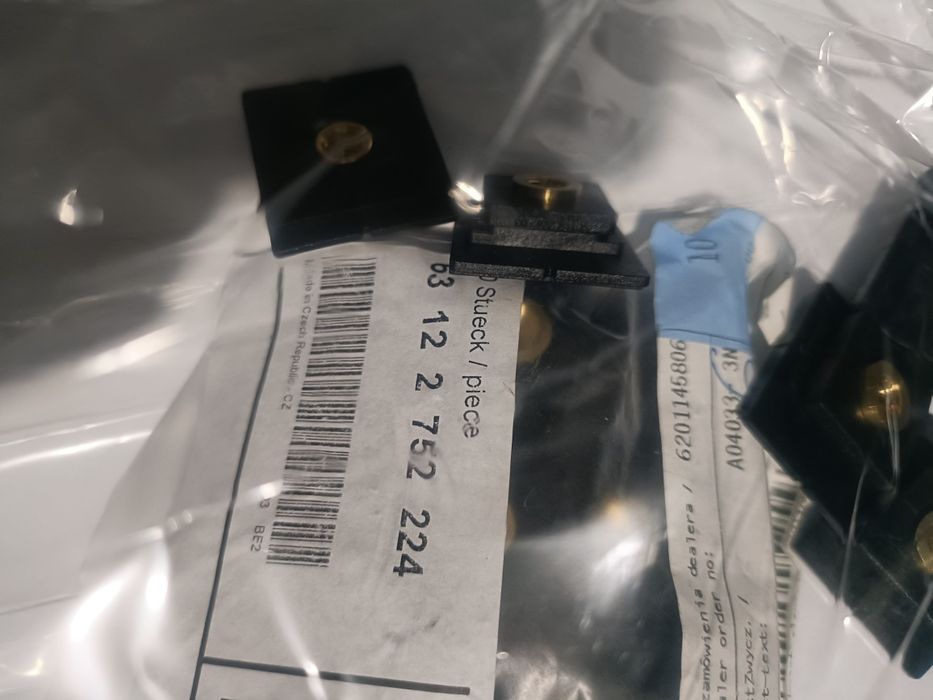 # Element mocujący reflektora kostka  MINI 63.122752.224