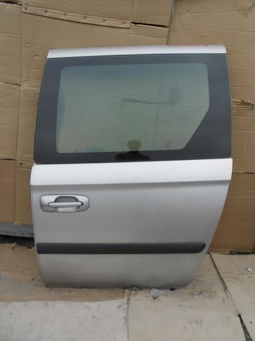 Drzwi Chrysler Voyager lewe przesuwne
