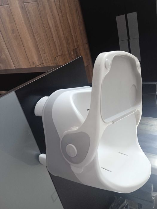Assento elevatório