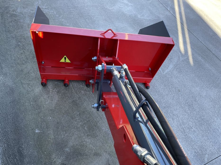 Carregador traseiro com comandos