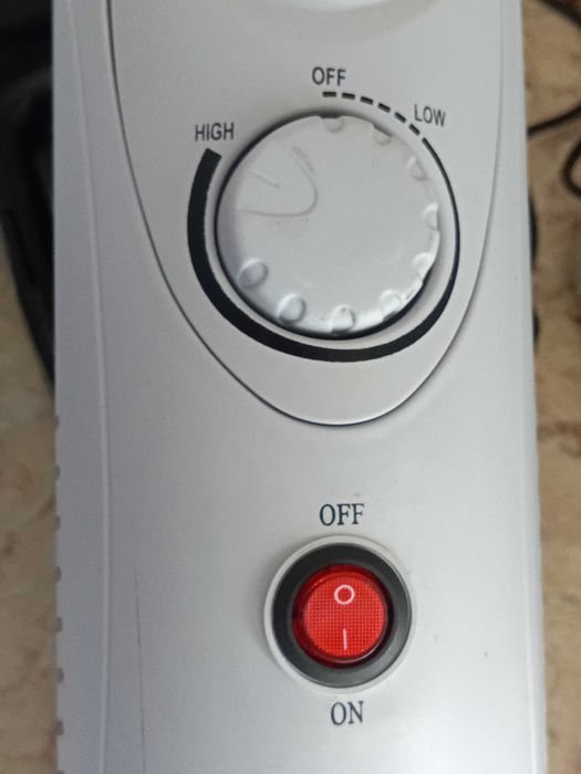 Mini radiador a óleo