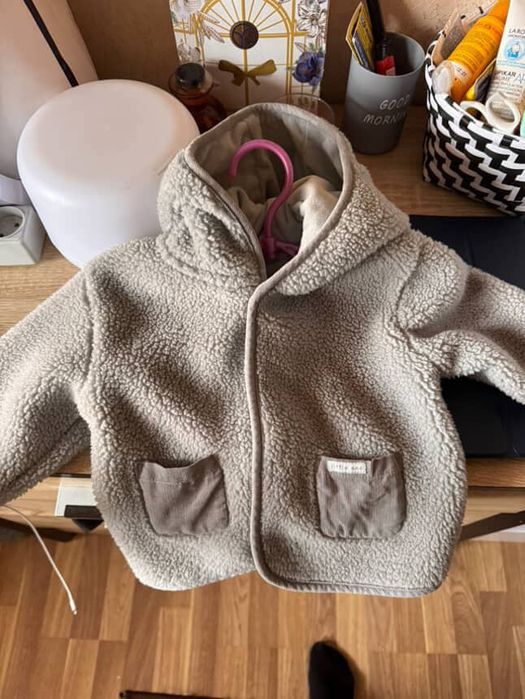 Продам флісову курточку некст розмір 9/12