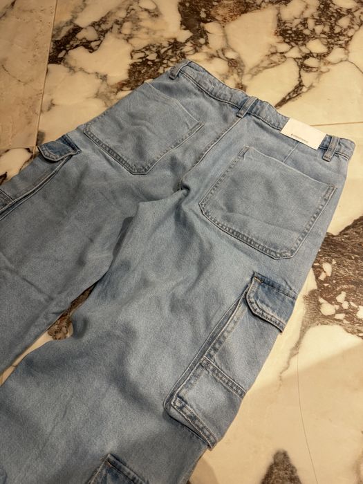 Spodnie jeansowe jeansy Stradivarius 38 M z kieszeniami luźne