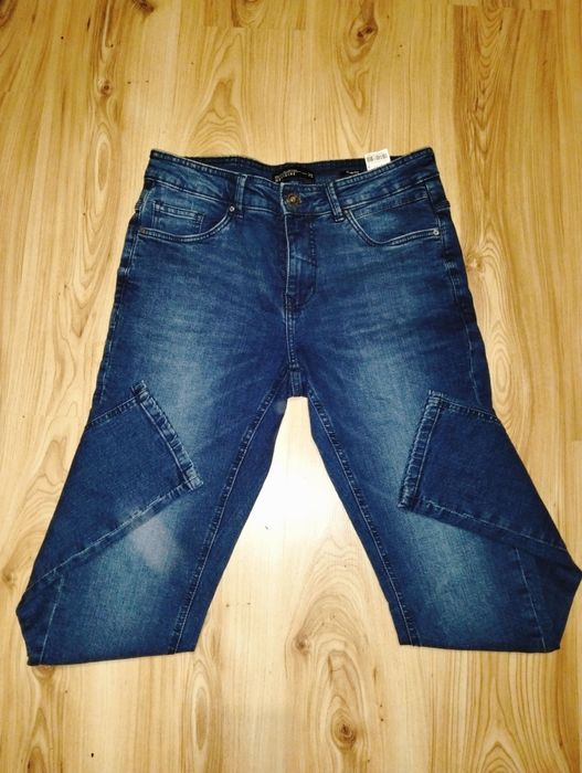 Spodnie jeans damskie