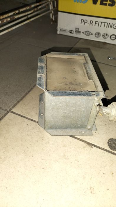 Regulator klapka ciągu kominowego.