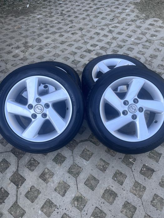 Komplet kół Mazda R16 – 2x Hankook + 2x Continental 205/55R16