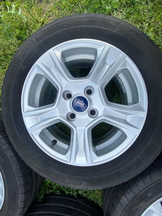 Alufelgi orginalne Ford 15-4x108 z oponami letnimi continental
