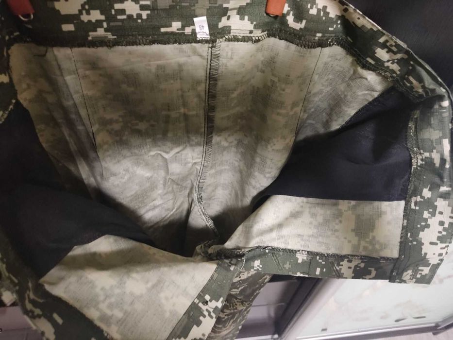 Штани камуфляжні нові