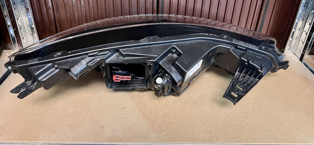 Renault Zeo lift lampa reflektor lewy