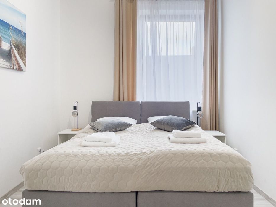 Przestronny Apartament z 2 Sypialniami i Balkonem
