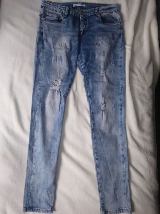 Spodnie jeans 40.        14