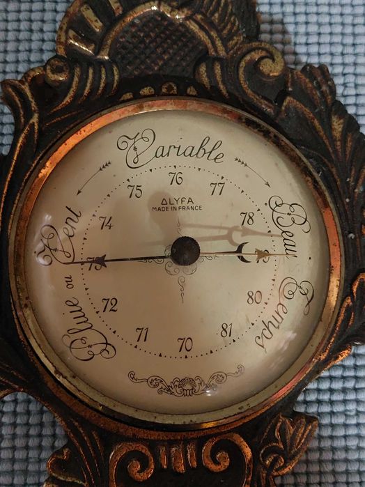 Barómetro antigo em bronze