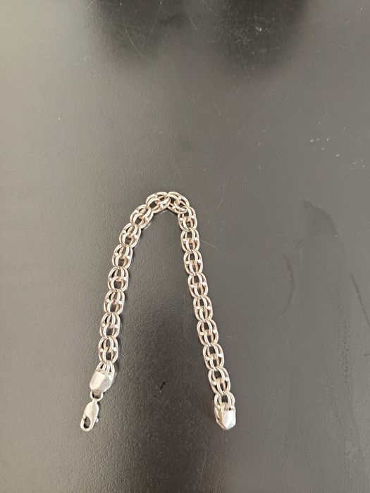 Серебряный браслет,он как новый..