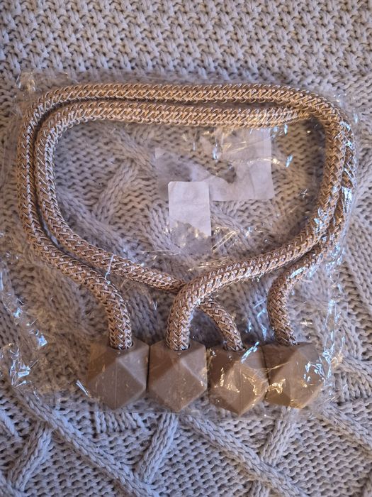 Тримачі для штор