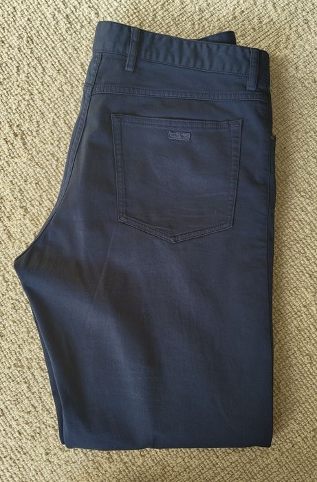 Camisas e calças de marca para homem