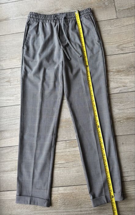 Męskie spodnie H&M w kratę rozm. XS