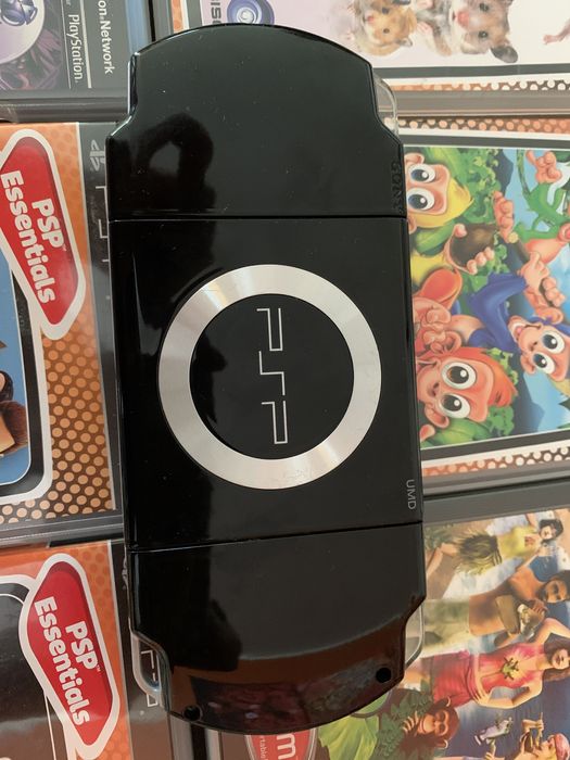 PSP in very good condition, without battery + charger + 6 games64170832514689122