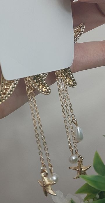 Luksusowe złote kolczyki w stylu morskim z zawieszkami