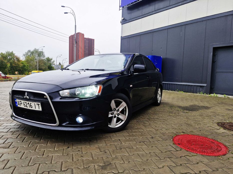 Митсубиши Лансер Х